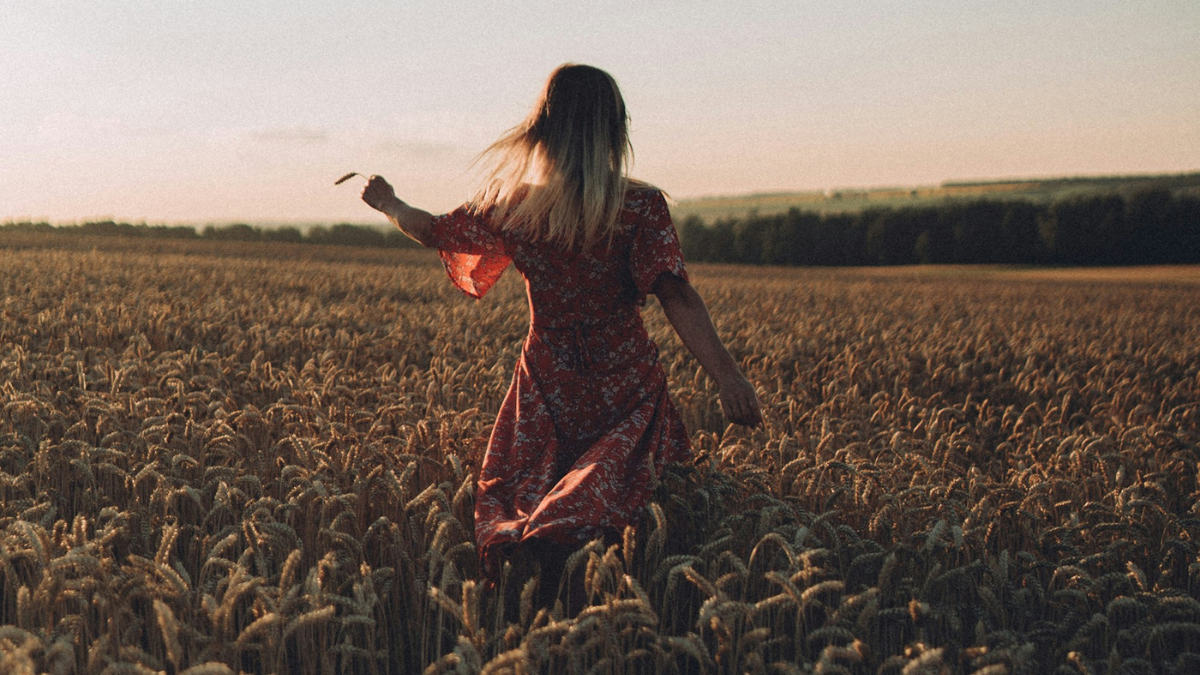 girl dancing in a field