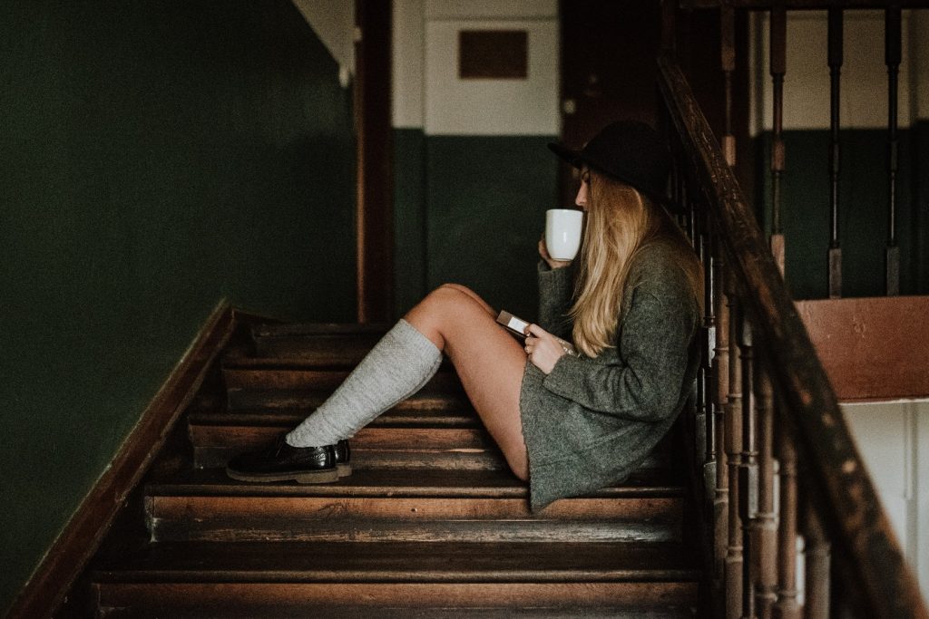 girl writing wondering if she's defined by my words