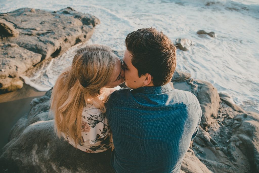 couple sitting on a rock Mr. Right