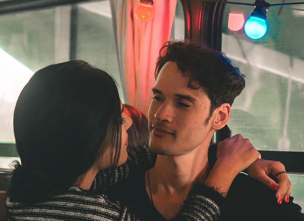 couple looking seriously into one another's eyes