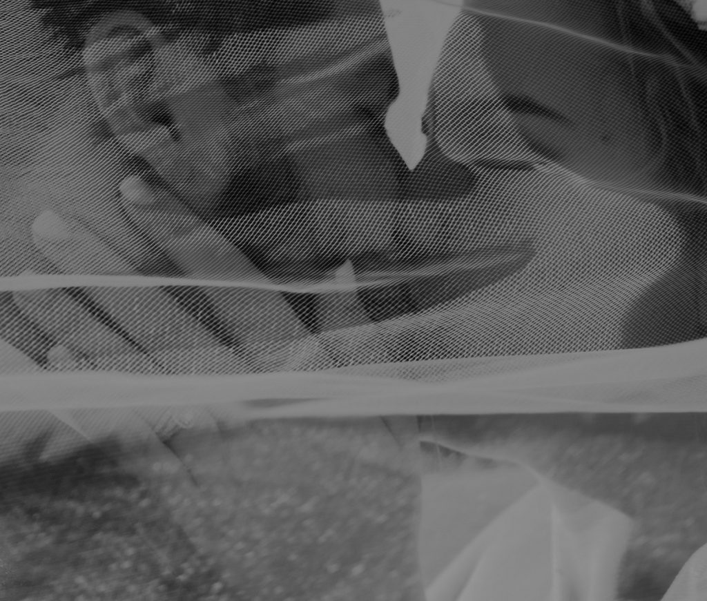 happy couple holding one another and kissing