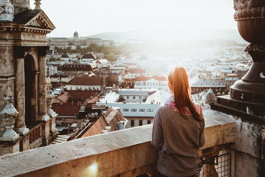 woman looking out over sky, falling is not failing