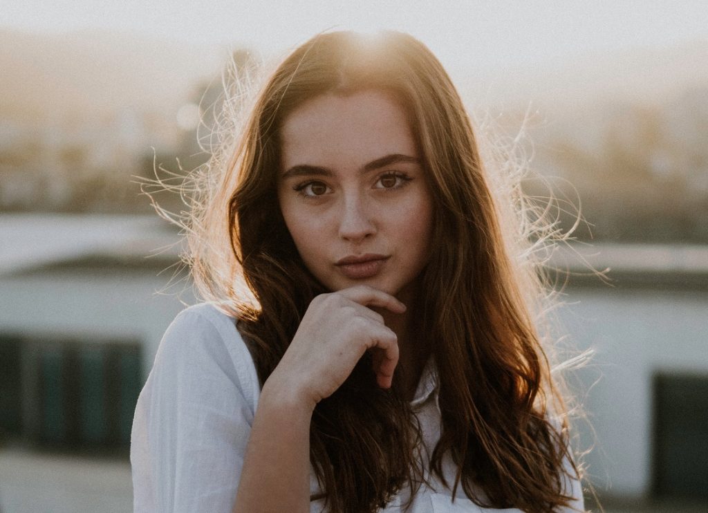 girl staring at the camera with no expression