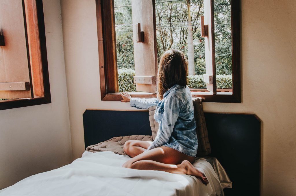 hurry up and slow down, happy woman in bed in morning