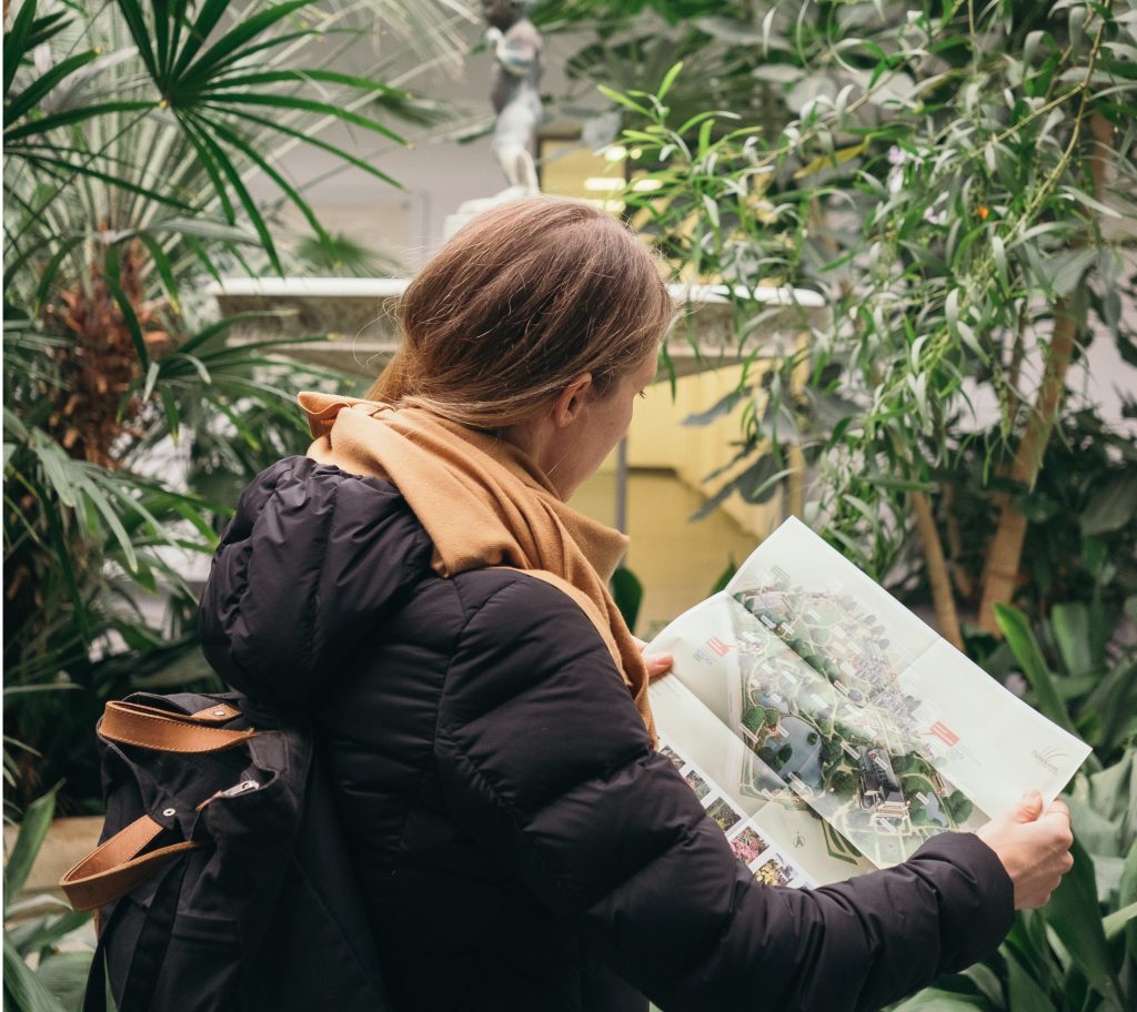 best gifts for travelers, woman holding map