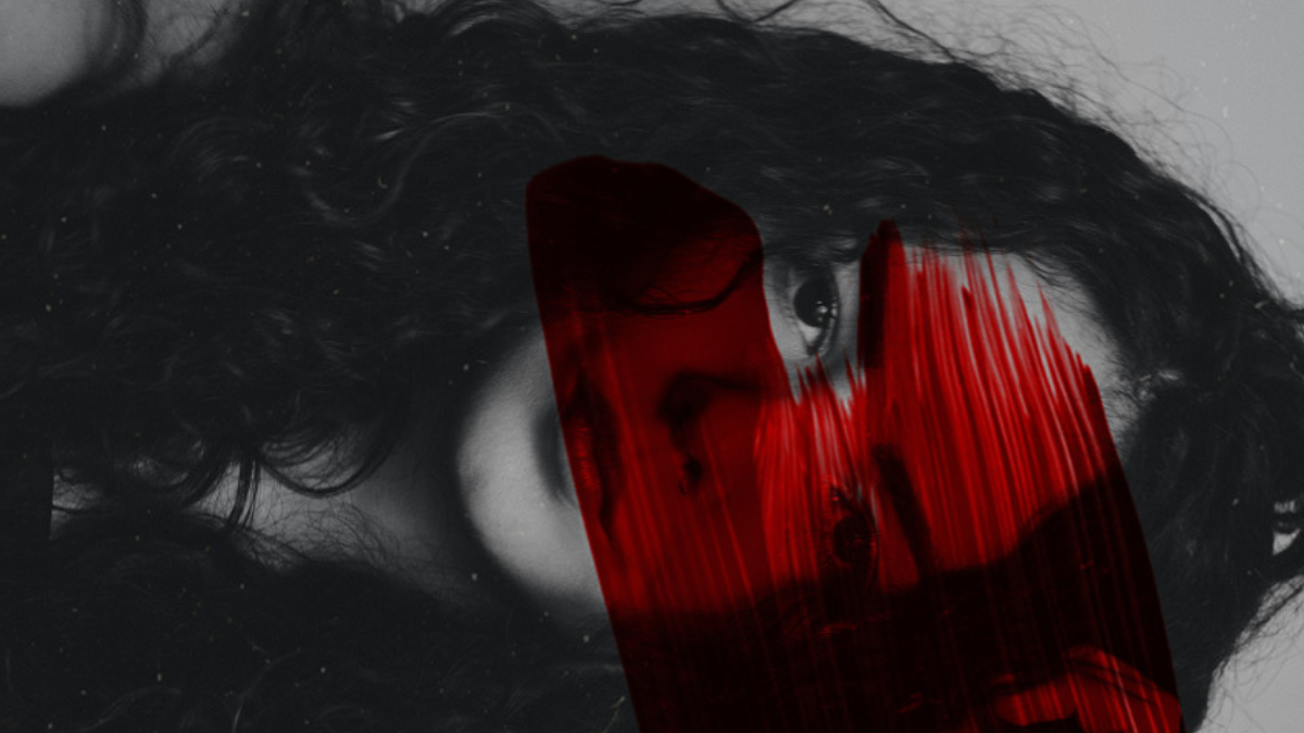 woman with red blood on her face