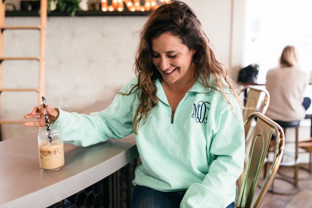 girl with positive perspective tirring coffee