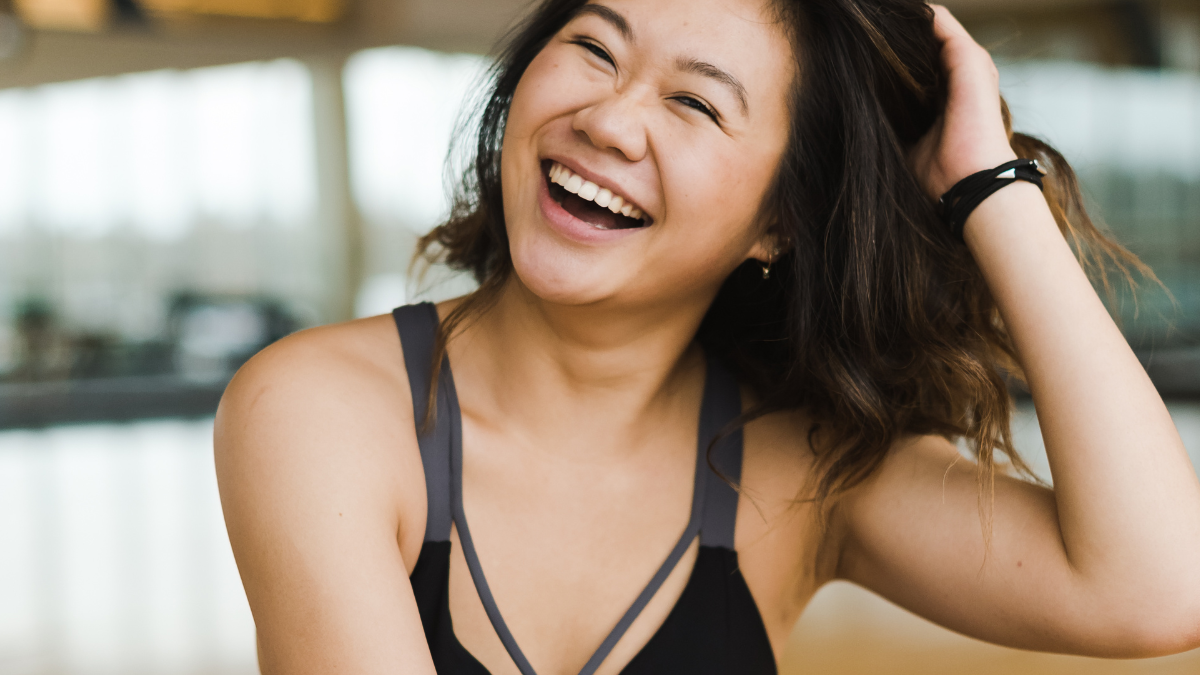 woman leaning into true happiness