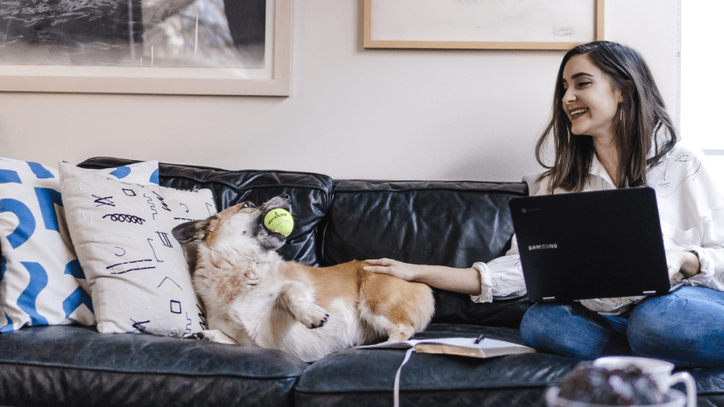 woman with dog practicing listening to your heart