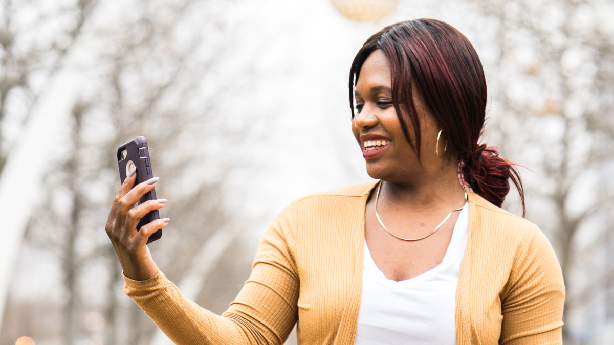 woman on Instagram deciding if she likes it or not