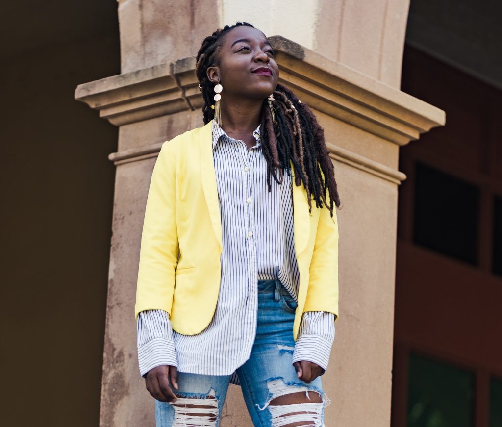 woman standing strong and happy not giving up