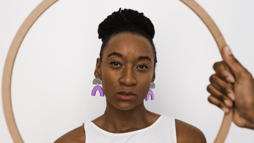 woman with strong face learning to turn negatives into positives