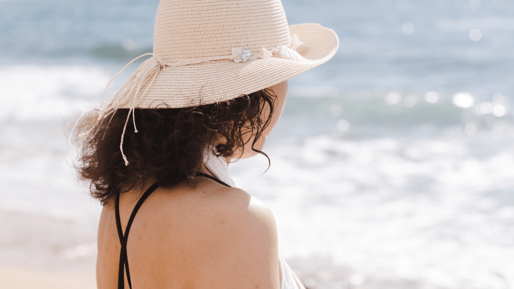 a woman experiencing life beyond recovery at the beach