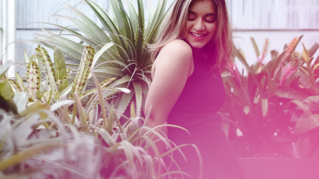 happy woman in the greenhouse