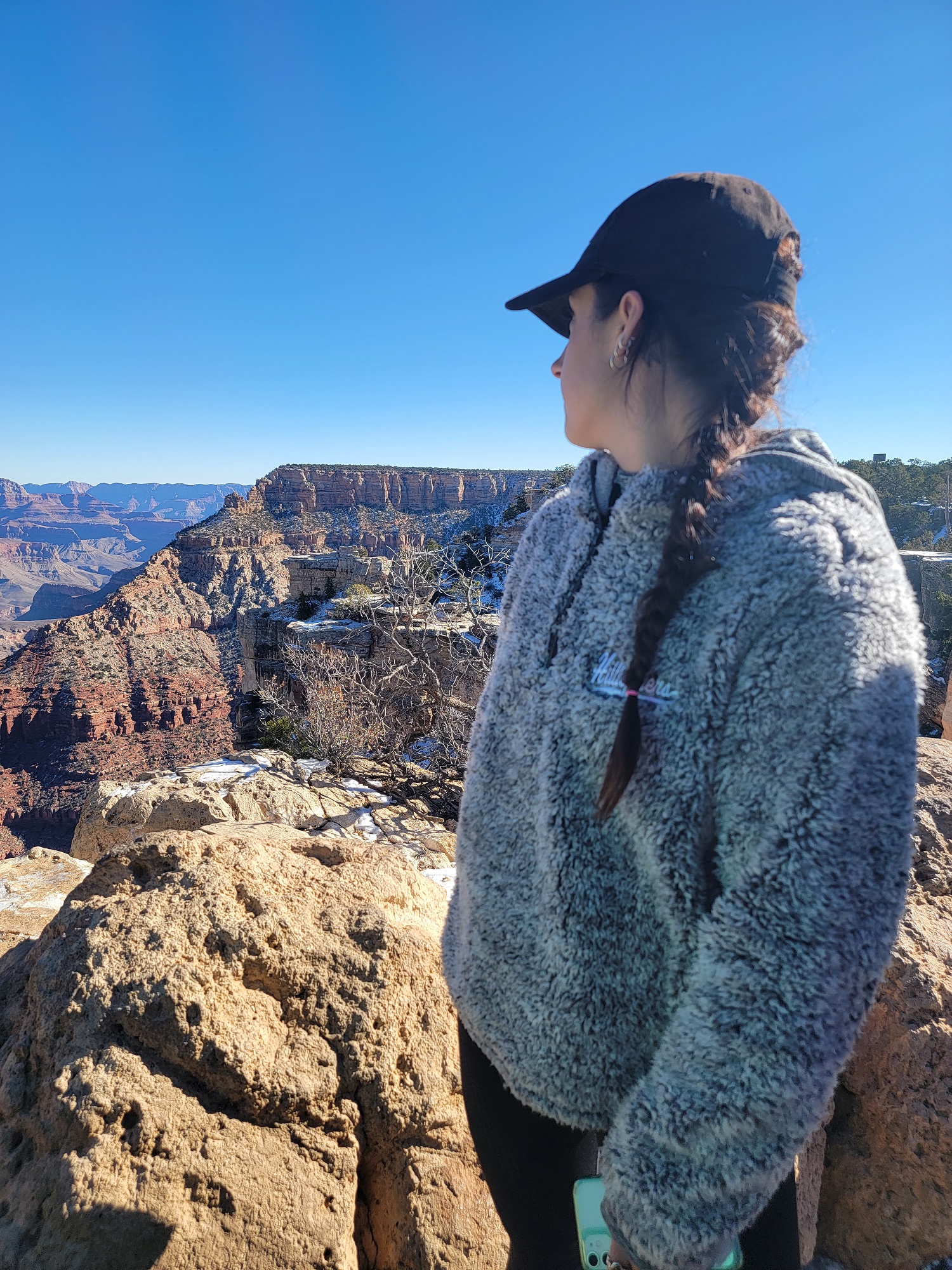 happy girl looking at the beauty of the mountains