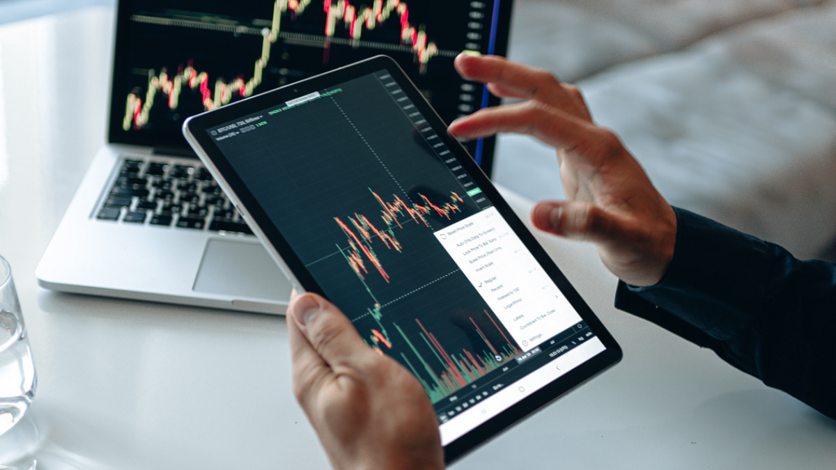 person working on SEO on his tablet