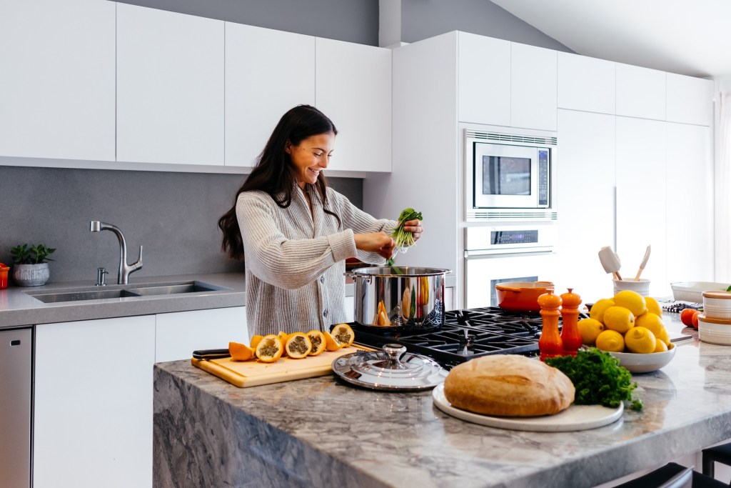 woman making healthy food in her kitchen