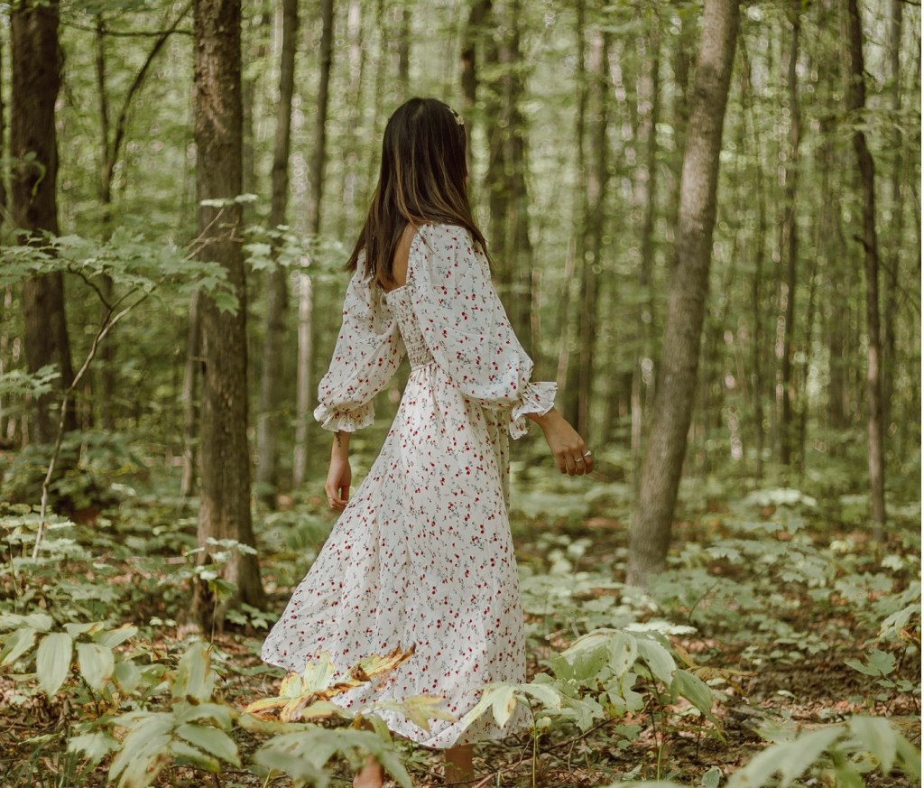 girl in forest with white dress
