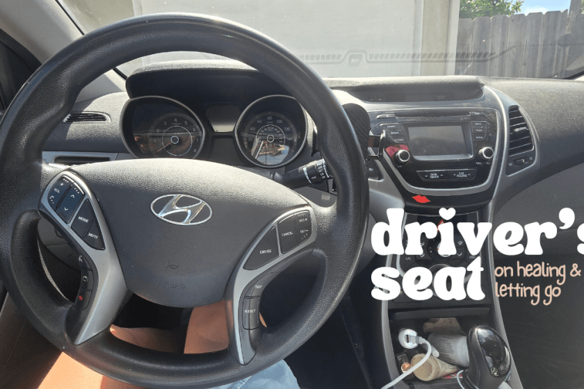 woman in the driver's seat of her healing