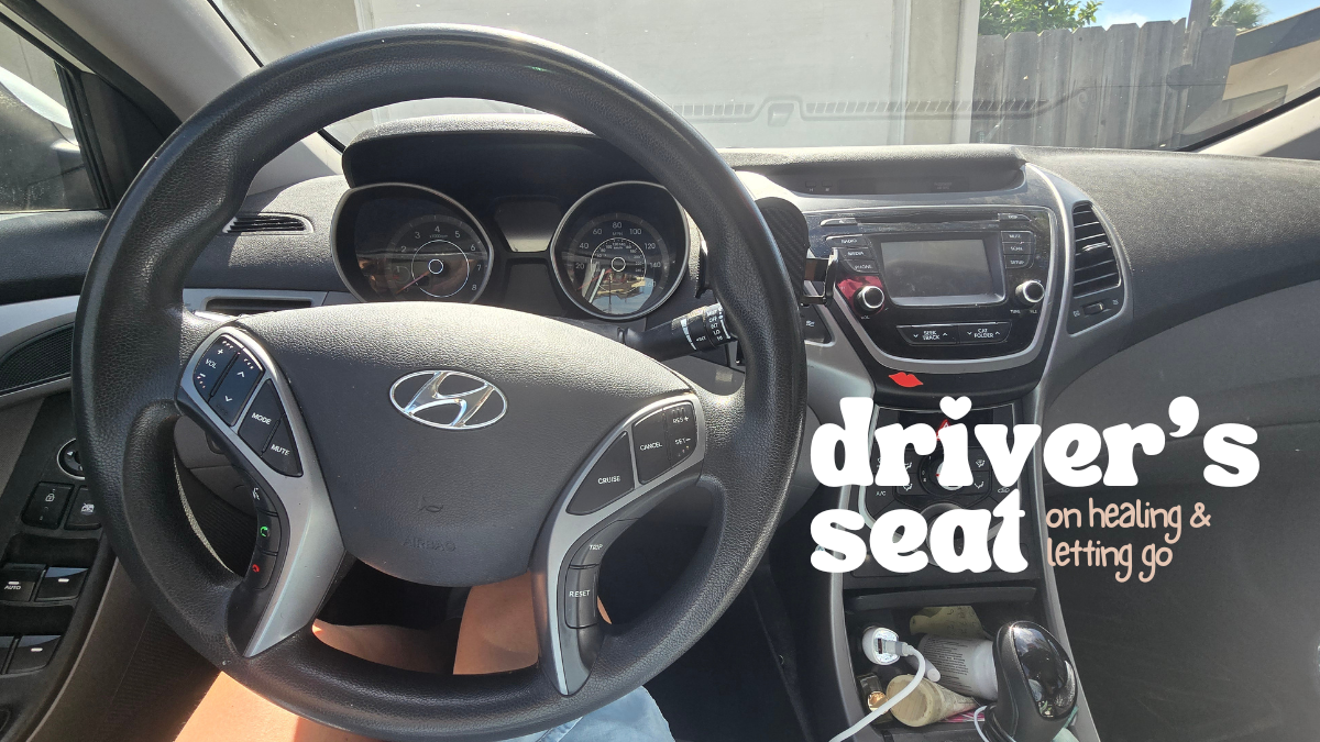 woman in the driver's seat of her healing